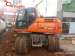    Doosan DX140W ()