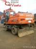    Doosan DX210W ()