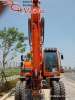  Doosan DX140W 2012  ()