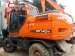  Doosan DX140W 2009  ()