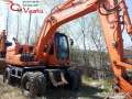    Doosan DX140W