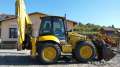 - .. Komatsu WB97S-5, 2008